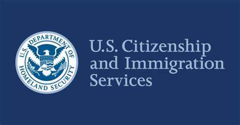 A blue and white logo of the u. S. Citizenship and immigration services